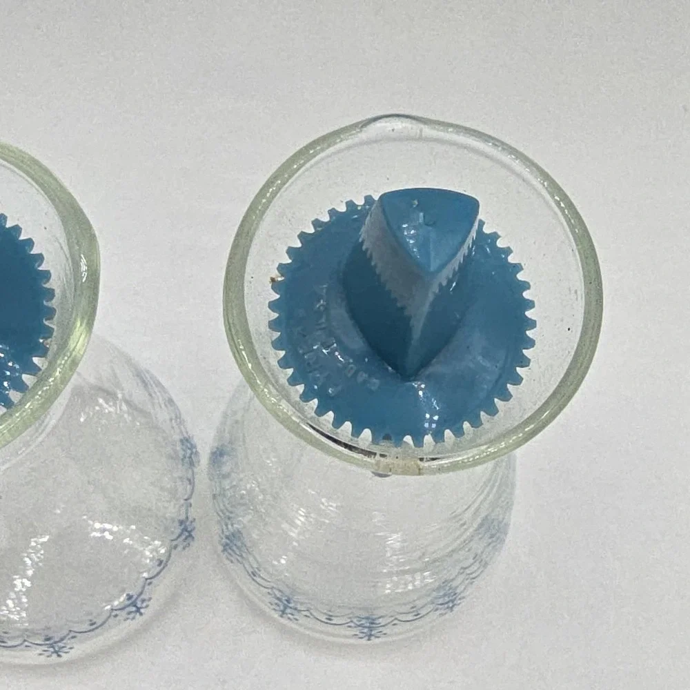 Vintage Pyrex salt and pepper shakers - Snowflake Garland Pattern Blue Clear